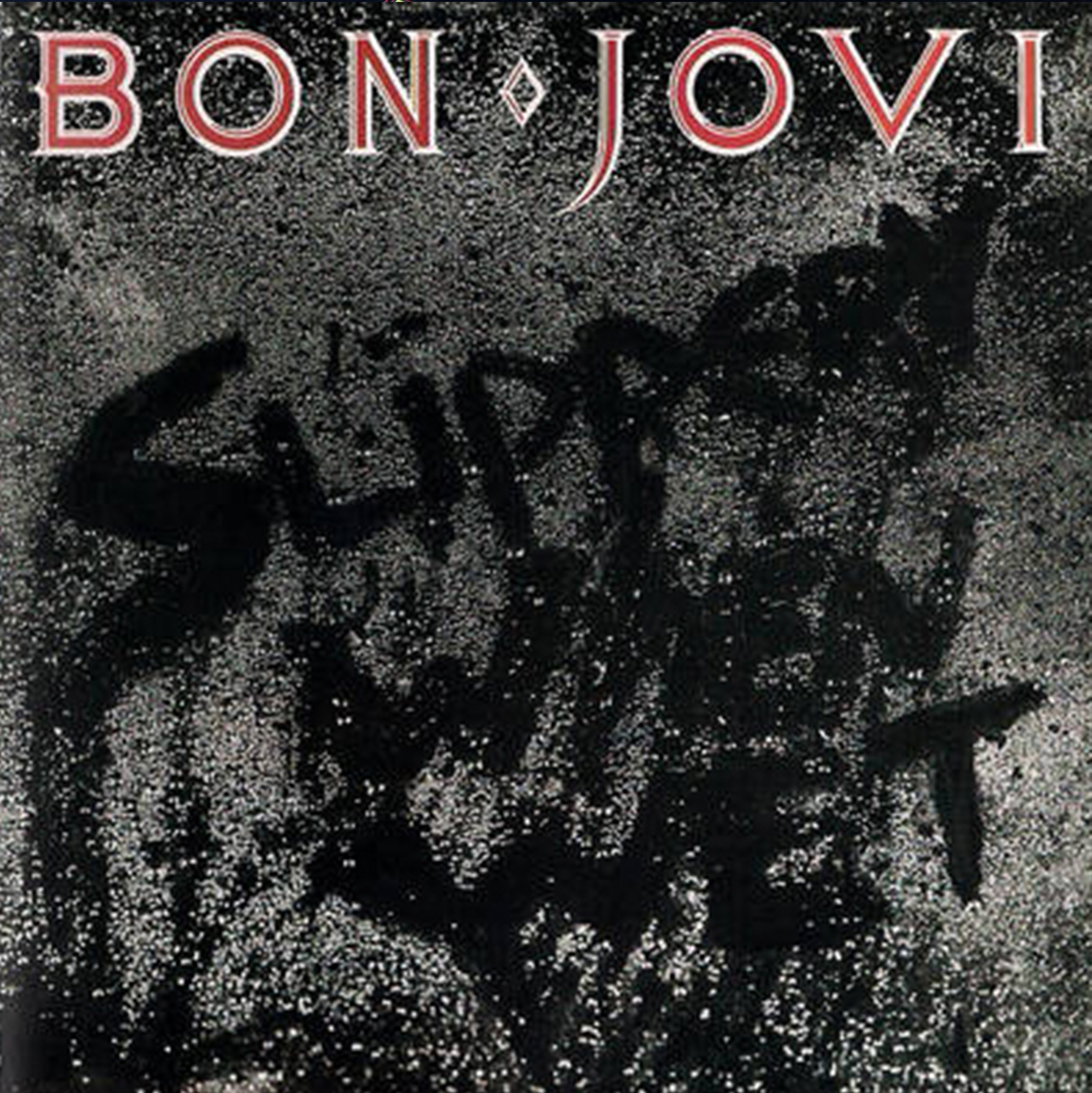 A black and white photo of the cover art for bon jovi 's album slippery when wet.