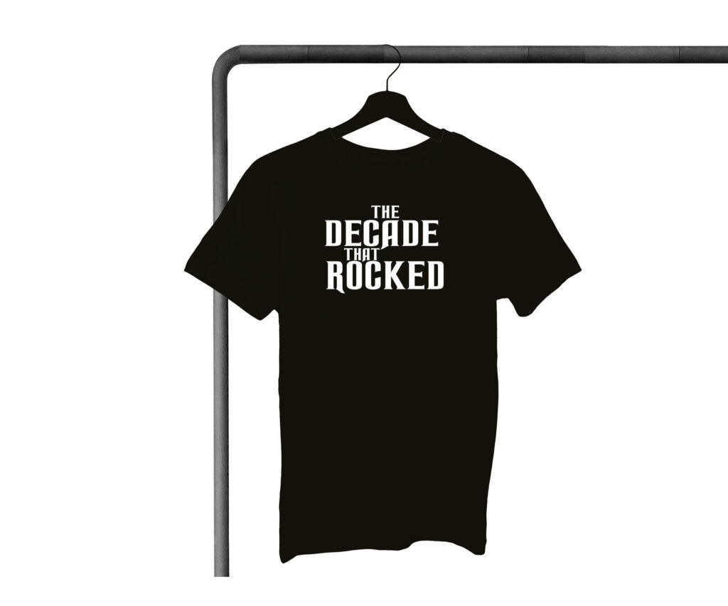 A black t-shirt hanging on a rack.